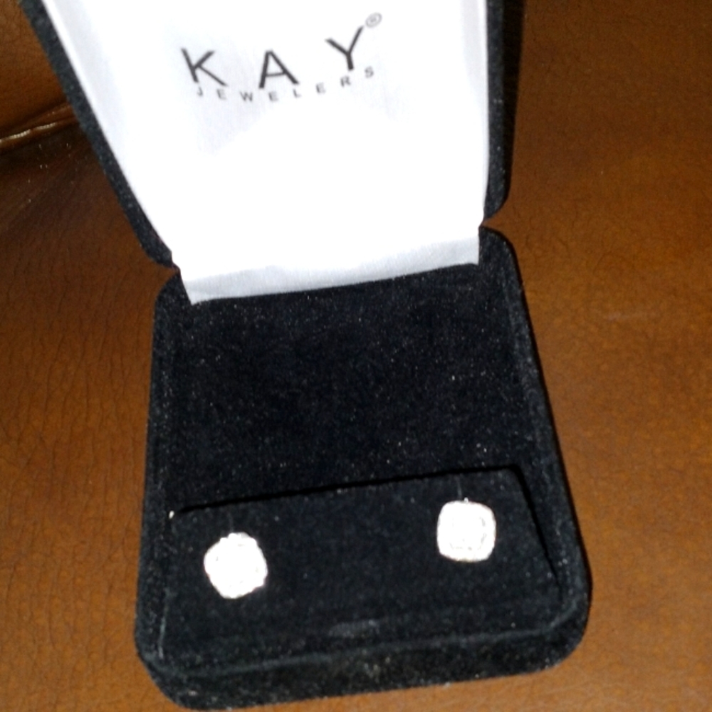 1 carat,  Halo styled -diamond and Sterling silver earrings from Kay's jewelry.